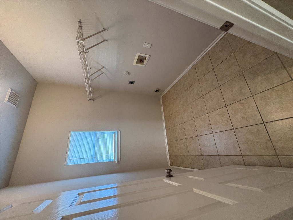 11510 Liberty Street Manor, TX 78653 - Photo 8 of 26 a view of a room with white walls
