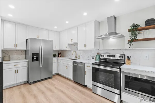 $335,000 | 7171 White Oak Lane, University City, MO 63130