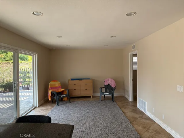 a view of a livingroom with furniture