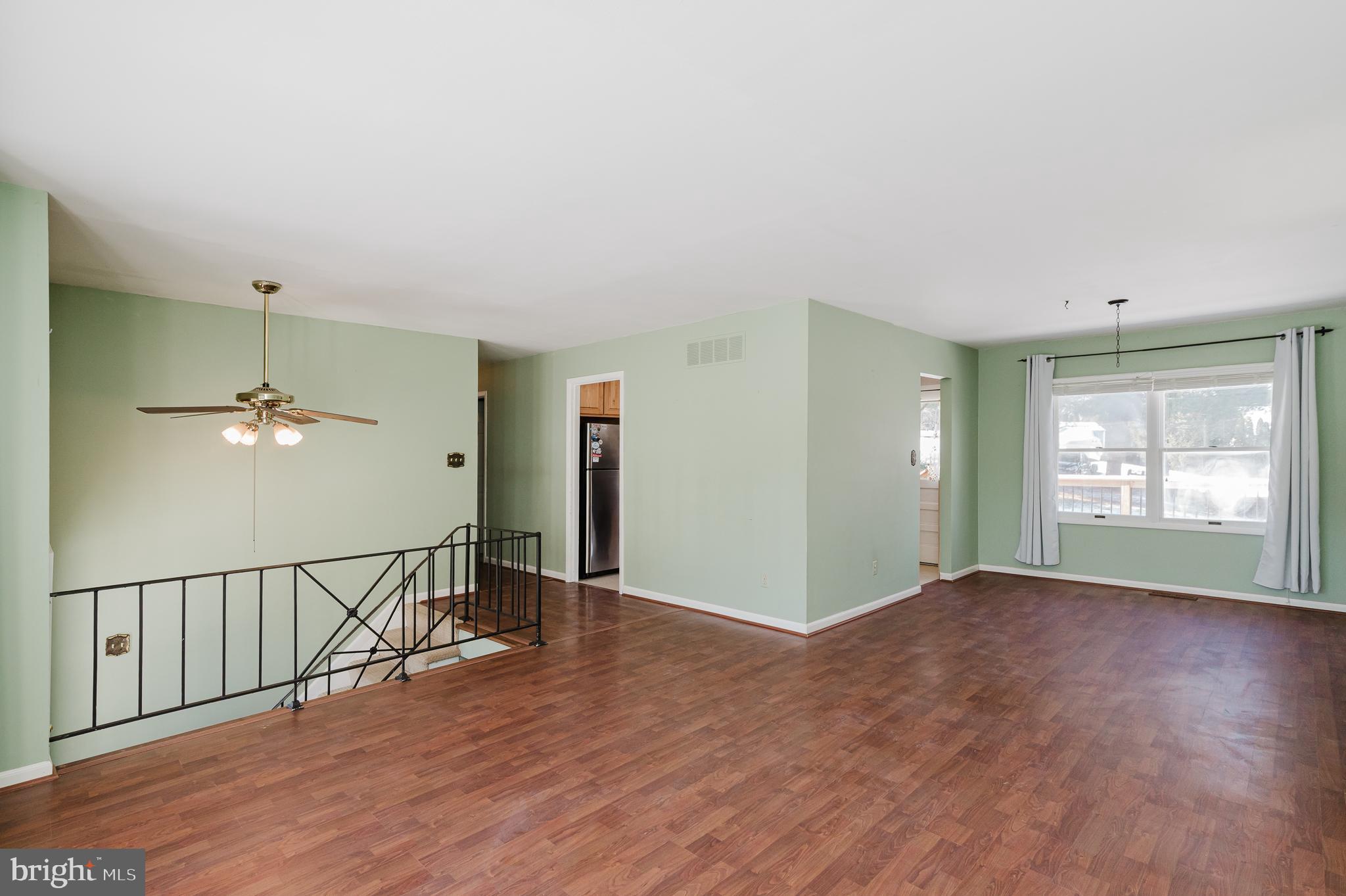 2804 Rocks Road Jarrettsville, MD 21084 - Photo 14 of 46 a view of an empty room with wooden floor and a window