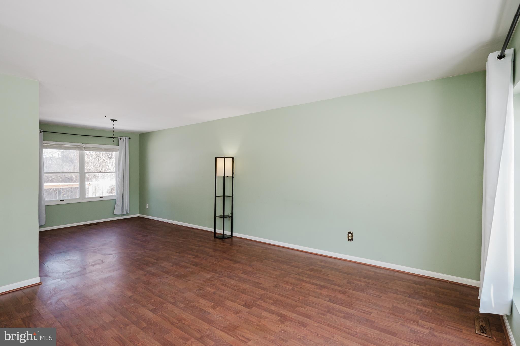 2804 Rocks Road Jarrettsville, MD 21084 - Photo 15 of 46 an empty room with wooden floor and windows