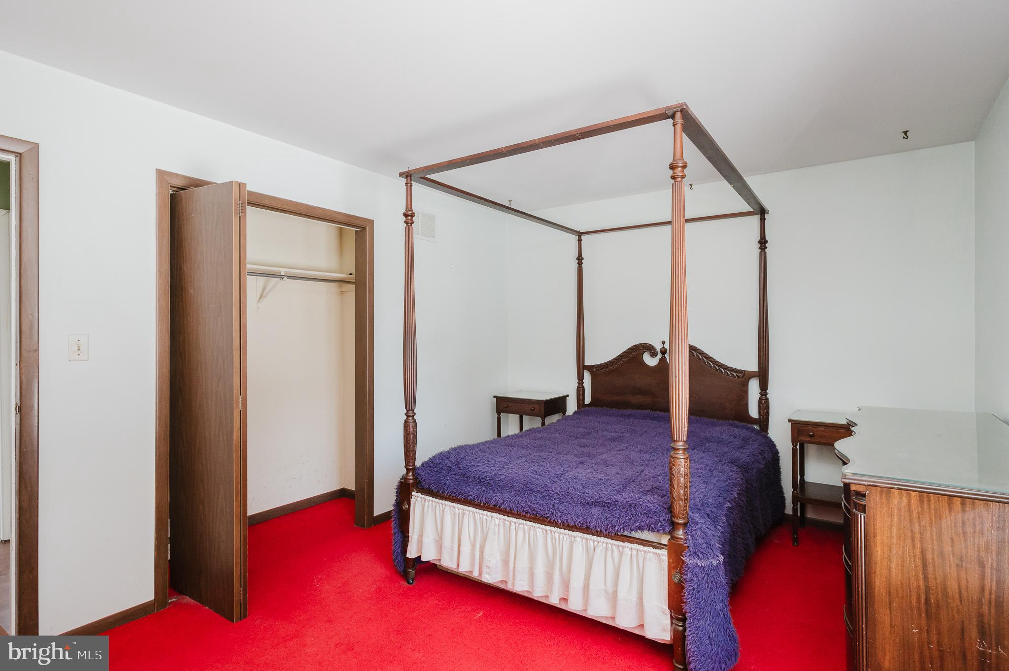 2804 Rocks Road Jarrettsville, MD 21084 - Photo 26 of 46 a bed room with a bed and a potted plant