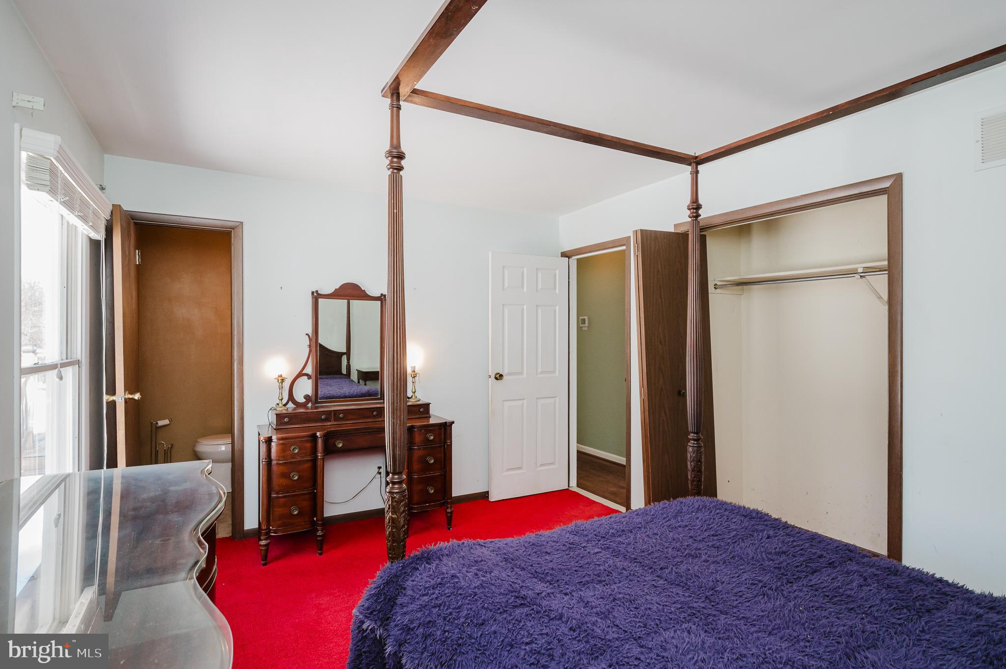 2804 Rocks Road Jarrettsville, MD 21084 - Photo 27 of 46 a bedroom with a bed and a refrigerator