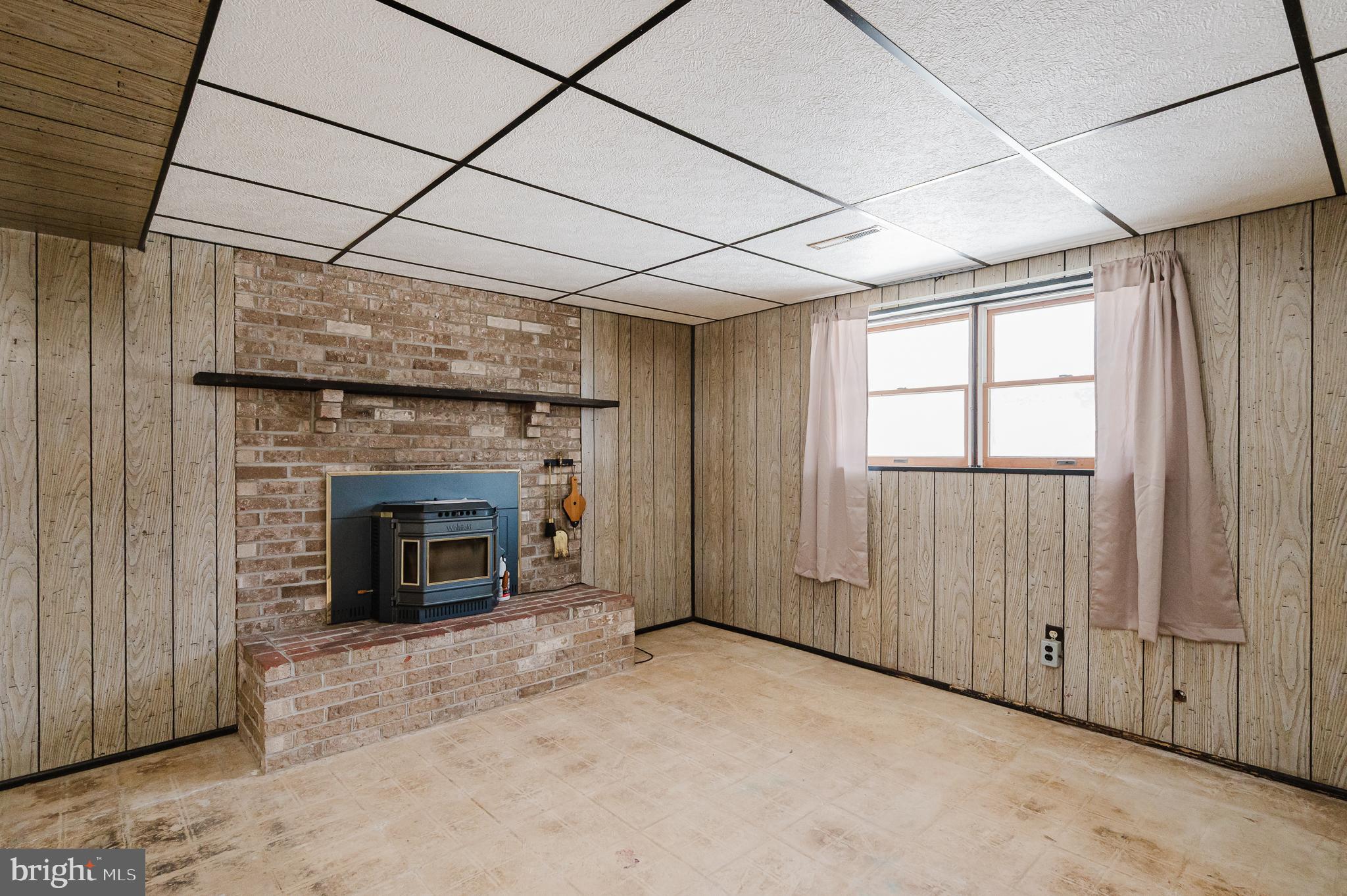 2804 Rocks Road Jarrettsville, MD 21084 - Photo 35 of 46 a view of an empty room with a fireplace