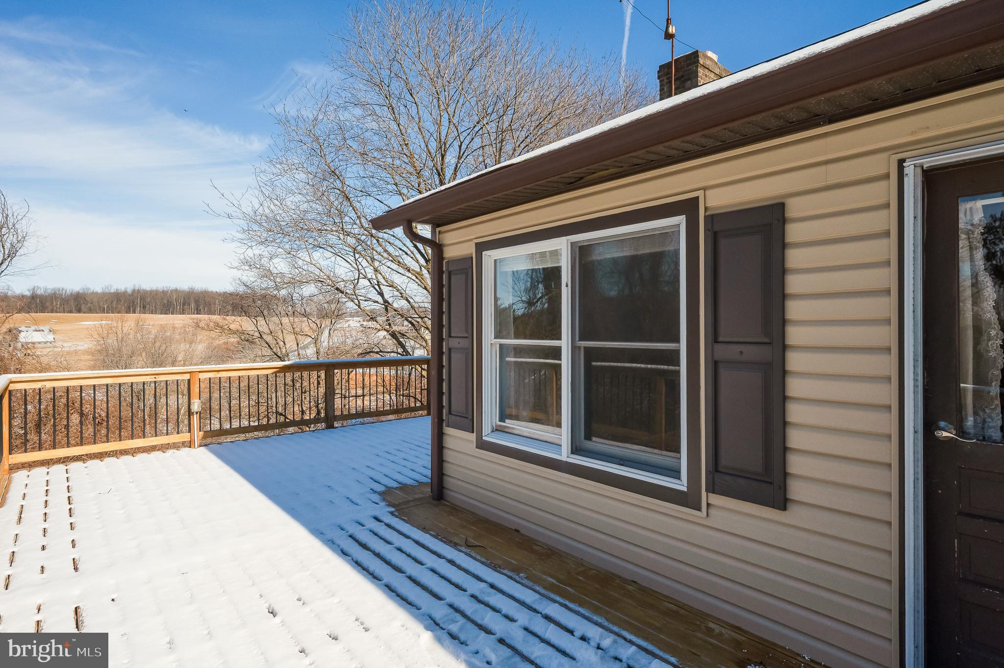 2804 Rocks Road Jarrettsville, MD 21084 - Photo 42 of 46 a view of a balcony with wooden floor