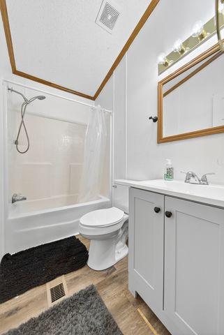 a view of a patio with chairs and a table and chairs