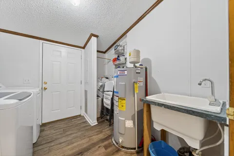 a living room with lots of furniture and lots of wooden floors