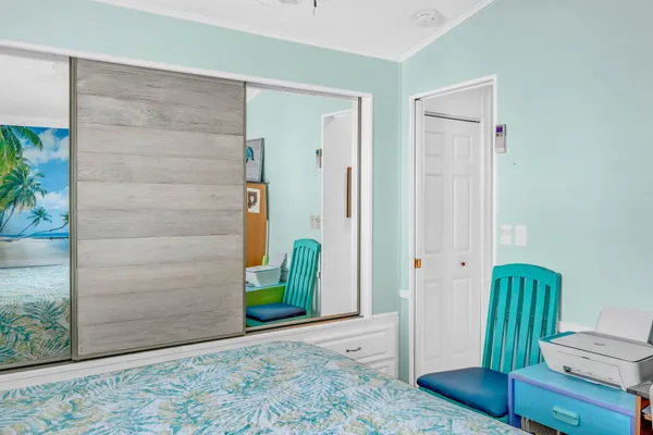 a bathroom with a sink double vanity and a mirror