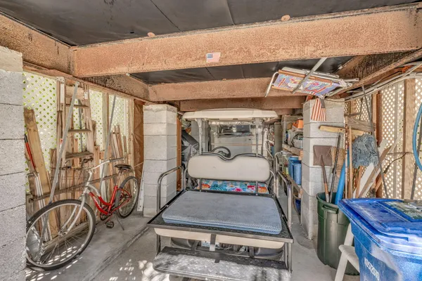 a backyard of a house with outdoor seating