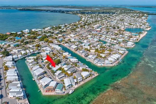 a table tennis table and chairs in a room