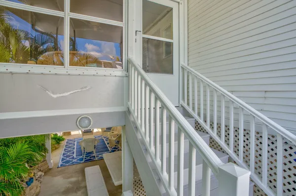 a view of entryway with wooden floor