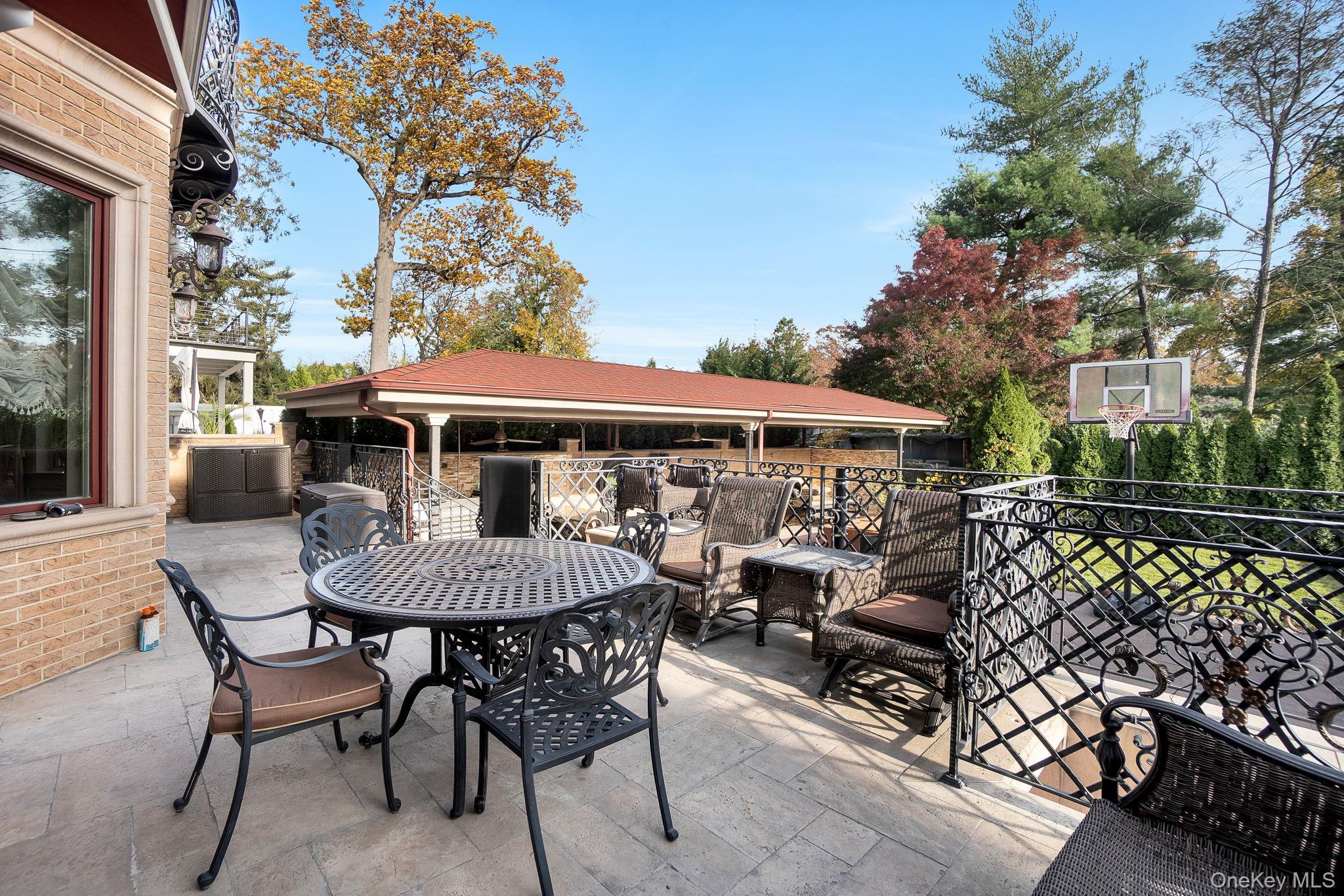 181-30 Tudor Road Queens, NY 11432 - Photo 44 of 46 View of patio / terrace featuring outdoor dining space