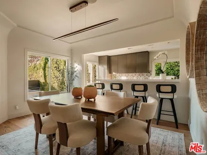 a bed room with a bed and a window