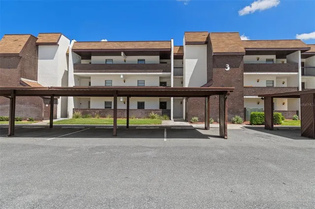 a view of a building with a lot of windows and entertaining space