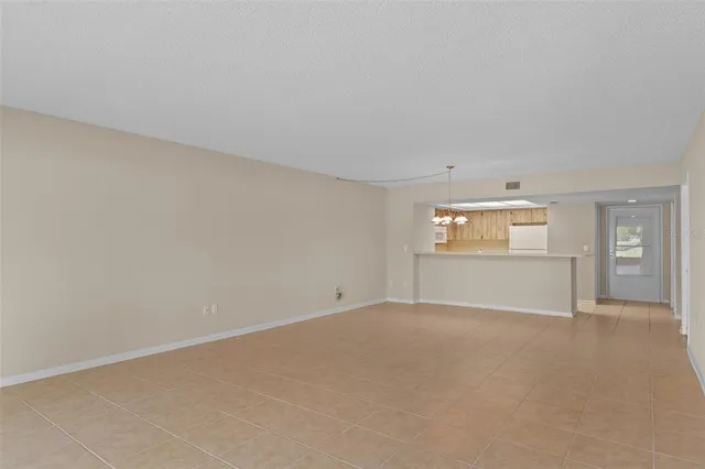 a kitchen with stainless steel appliances a sink and a refrigerator