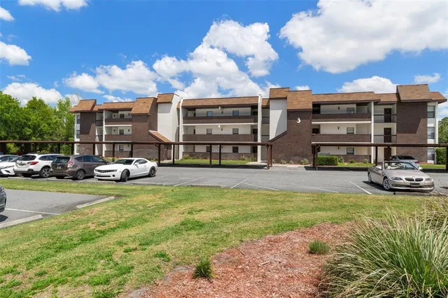 a view of a building with a garden
