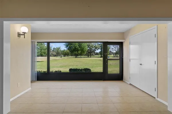 a kitchen with stainless steel appliances a sink and a refrigerator