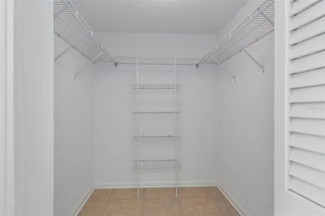 a view of outdoor space with green field and trees