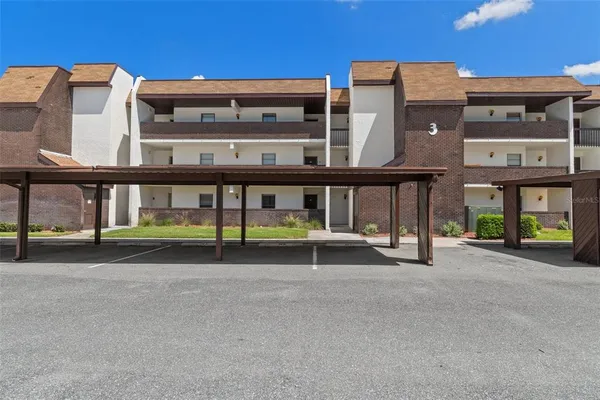 a view of a building with a garden