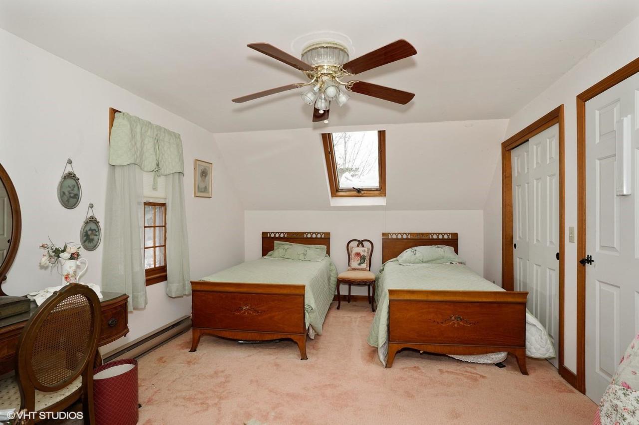 60 Ridge St Extension Wellfleet, MA 02667 - Photo 17 of 21 a bedroom with furniture and a window