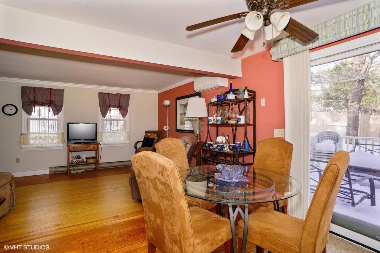 60 Ridge St Extension Wellfleet, MA 02667 - Photo 8 of 21 a view of a dining room with furniture window and outside view