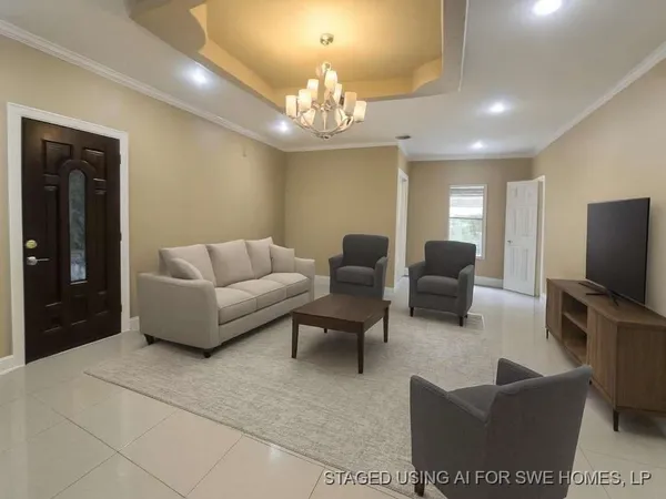 a living room with furniture a chandelier and a flat screen tv