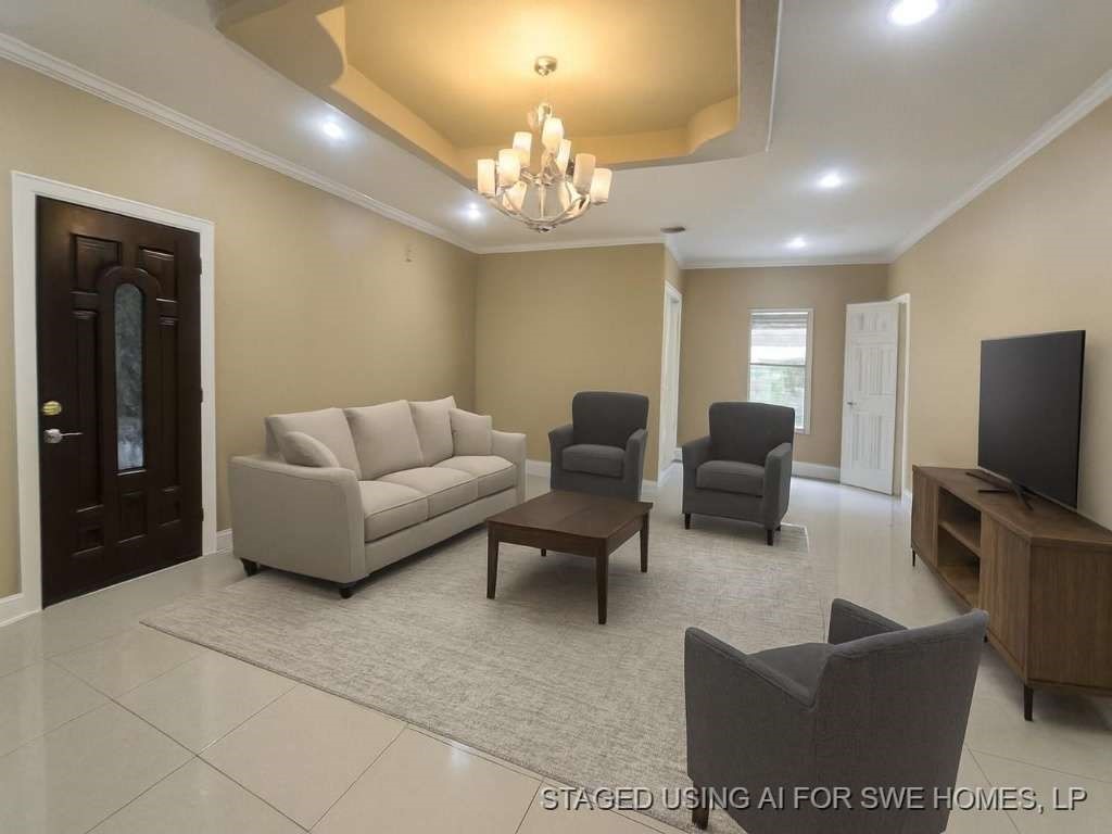 11529 Warner Road Cleveland, TX 77328 - Photo 13 of 27 a living room with furniture a chandelier and a flat screen tv