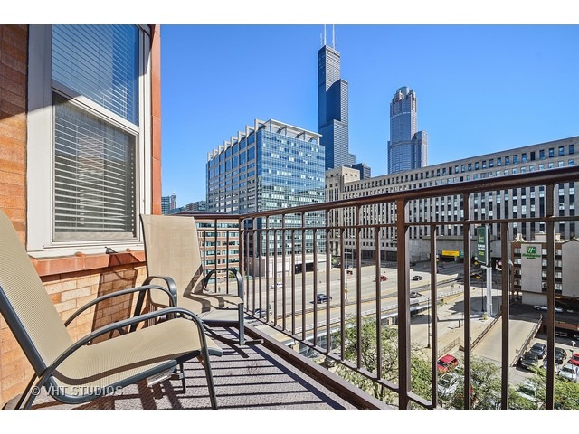 500 South Clinton Street, Unit 603 Chicago, IL 60607 - Photo 9 of 10 a view of balcony with two chairs and a table