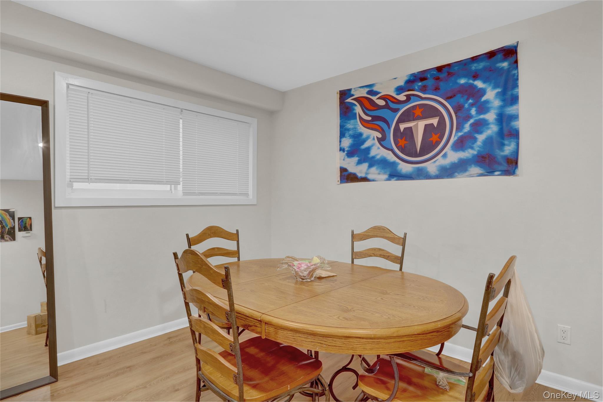 220 East Chester Street Long Beach, NY 11561 - Photo 5 of 26 a table with chair and a table