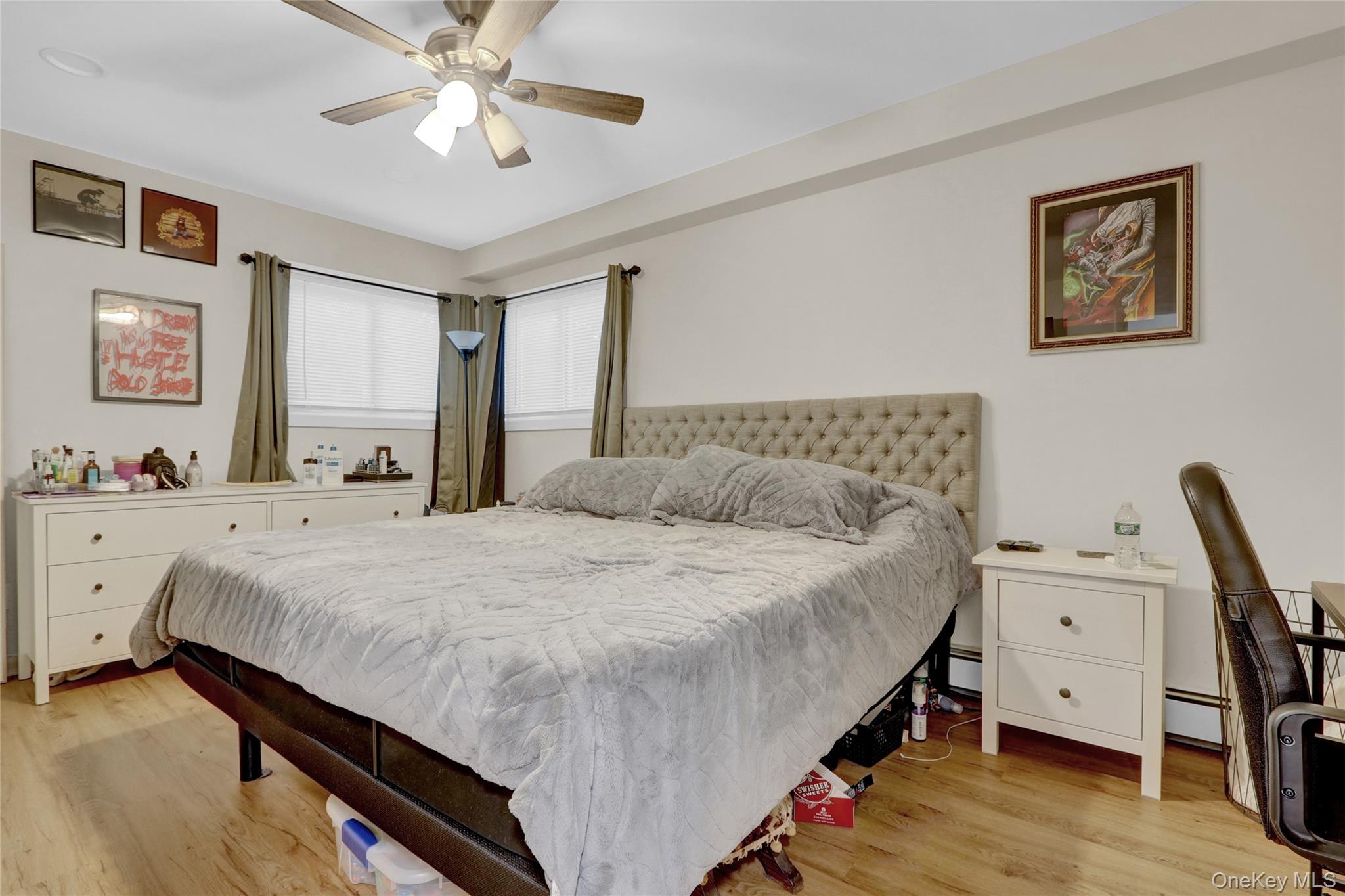 220 East Chester Street Long Beach, NY 11561 - Photo 8 of 26 a bed room with a bed and a desk