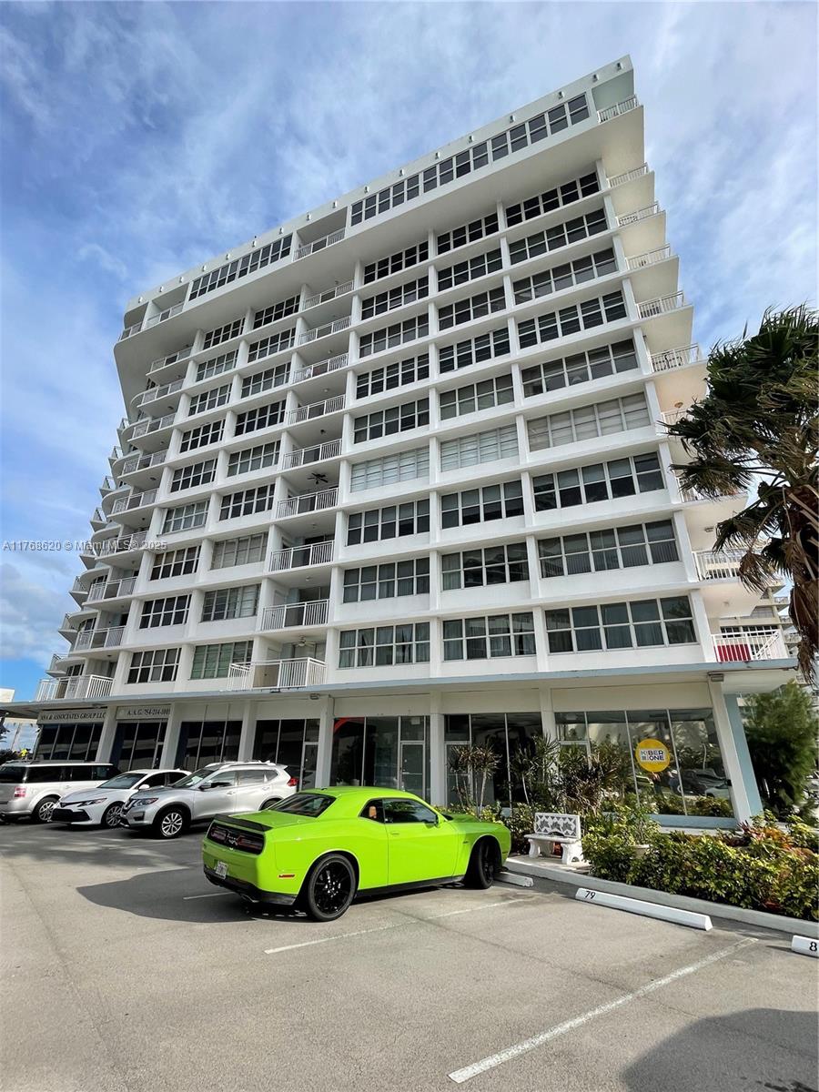 Oceanside Hallandale Beach, FL 33009 - Photo 28 of 49 front view of a building with a street