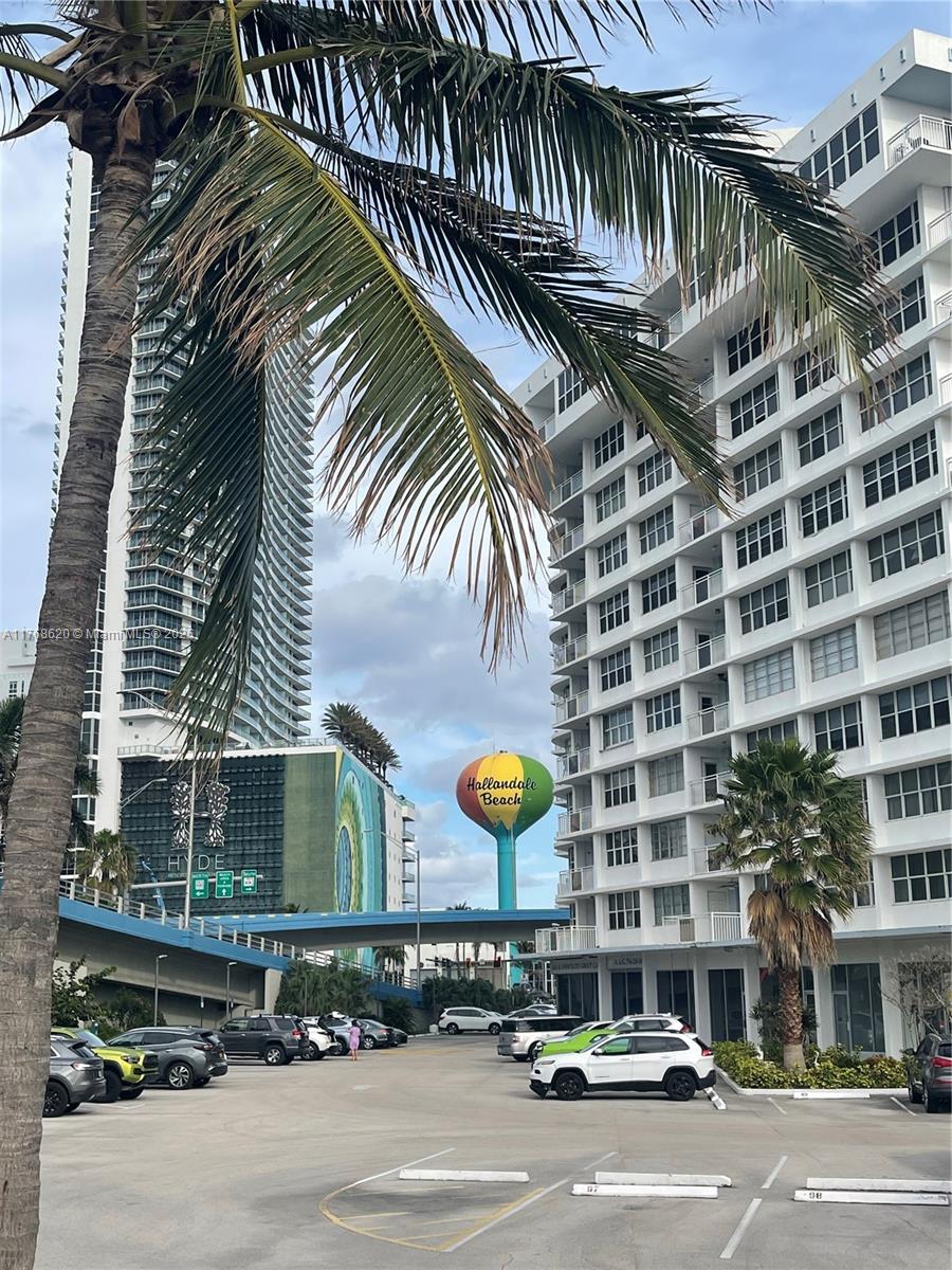 Oceanside Hallandale Beach, FL 33009 - Photo 3 of 49 a view of a building and car parked on the street