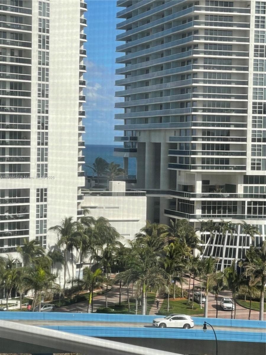 Oceanside Hallandale Beach, FL 33009 - Photo 43 of 49 a bathroom with a sink and a mirror