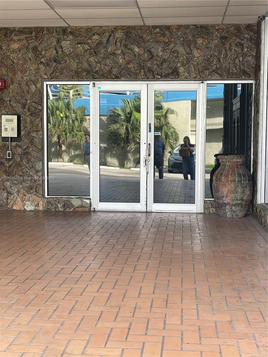 Oceanside Hallandale Beach, FL 33009 - Photo 46 of 49 a view of backyard with tub and door