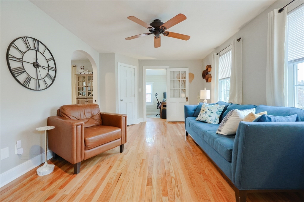 14 Cardinal Road Worcester, MA 01602 - Photo 12 of 28 a living room with furniture a bed and a chandelier