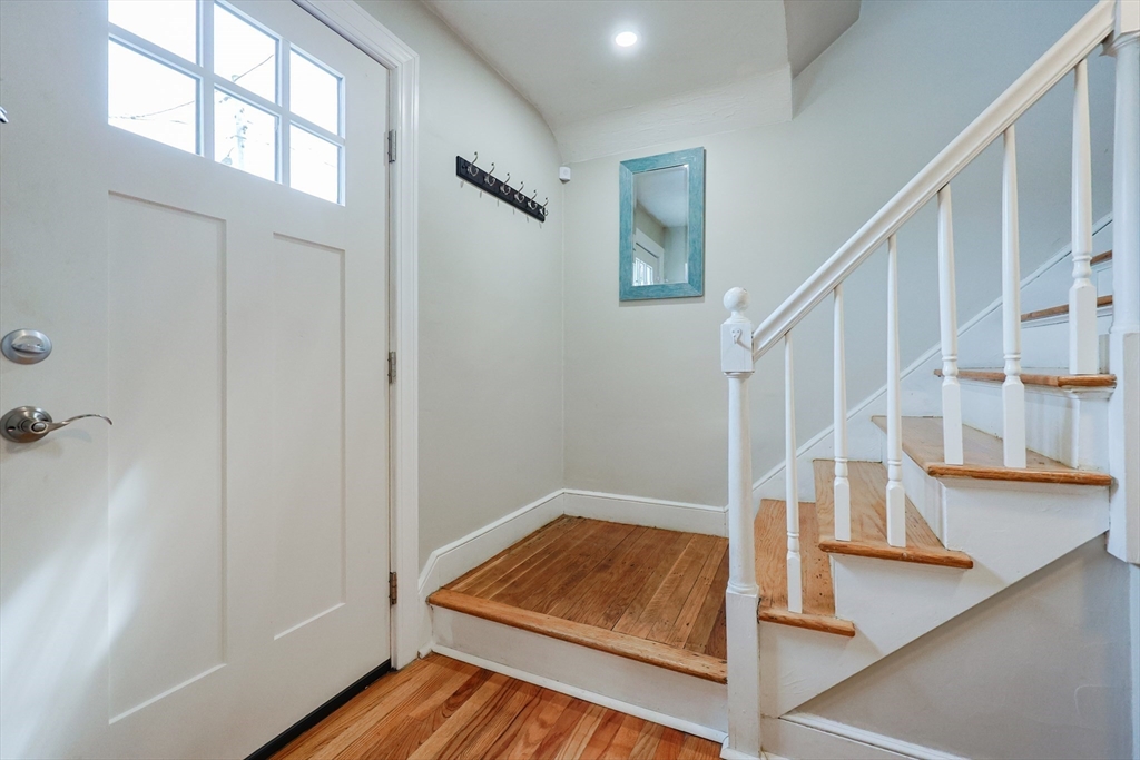 14 Cardinal Road Worcester, MA 01602 - Photo 17 of 28 a view of staircase with white walls and railing next to a window
