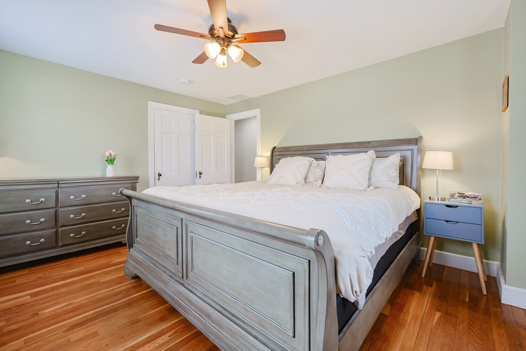 14 Cardinal Road Worcester, MA 01602 - Photo 19 of 28 a bedroom with a bed and a chandelier