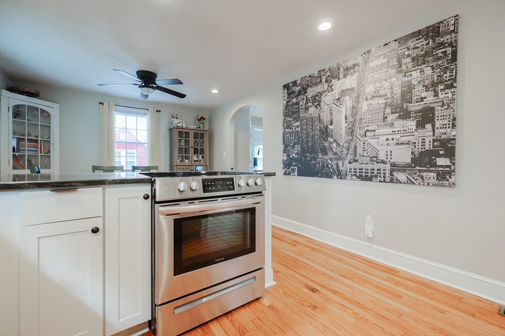 14 Cardinal Road Worcester, MA 01602 - Photo 4 of 28 a kitchen with stainless steel appliances granite countertop a stove and a microwave