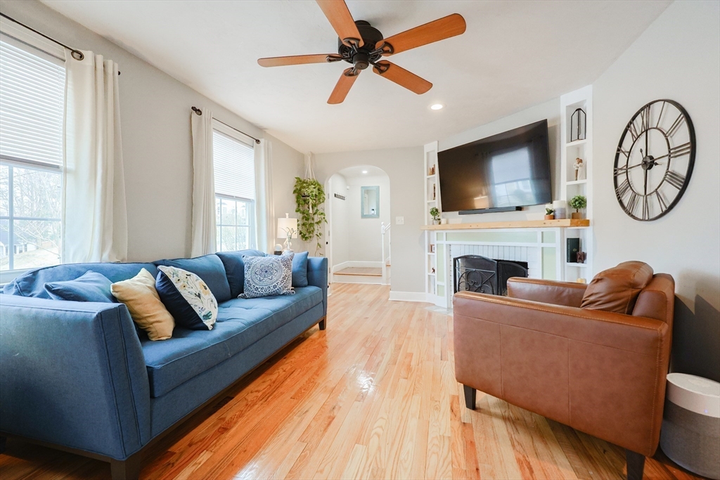 14 Cardinal Road Worcester, MA 01602 - Photo 10 of 28 a living room with fireplace furniture and a flat screen tv