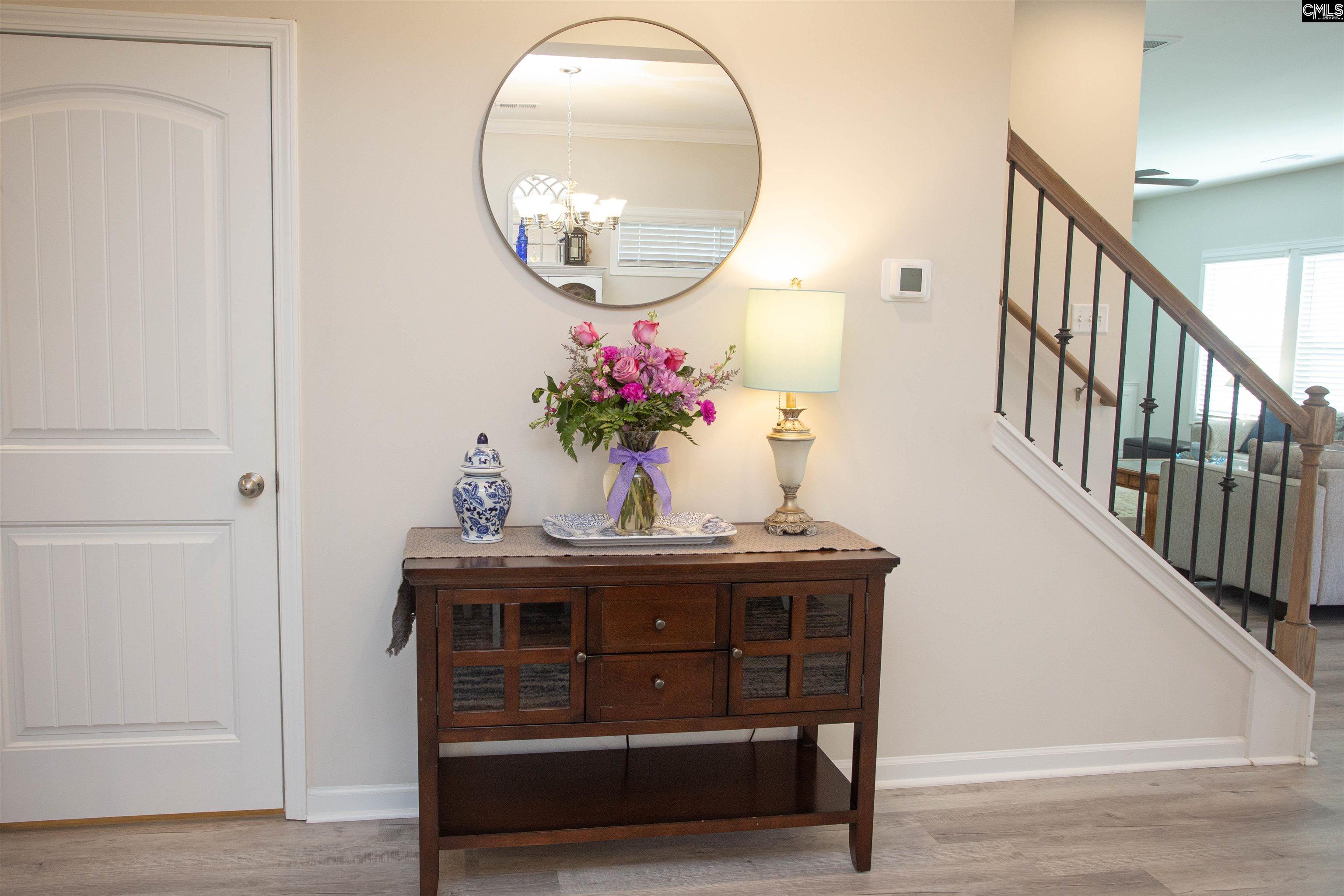 272 Shadowbrook Way Camden, SC 29020 - Photo 8 of 43 a view of a hallway with wooden floor and front door