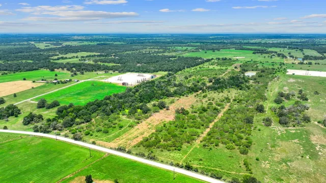 a view of a green field with lots of green space in it