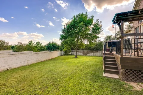 a view of a backyard with a garden