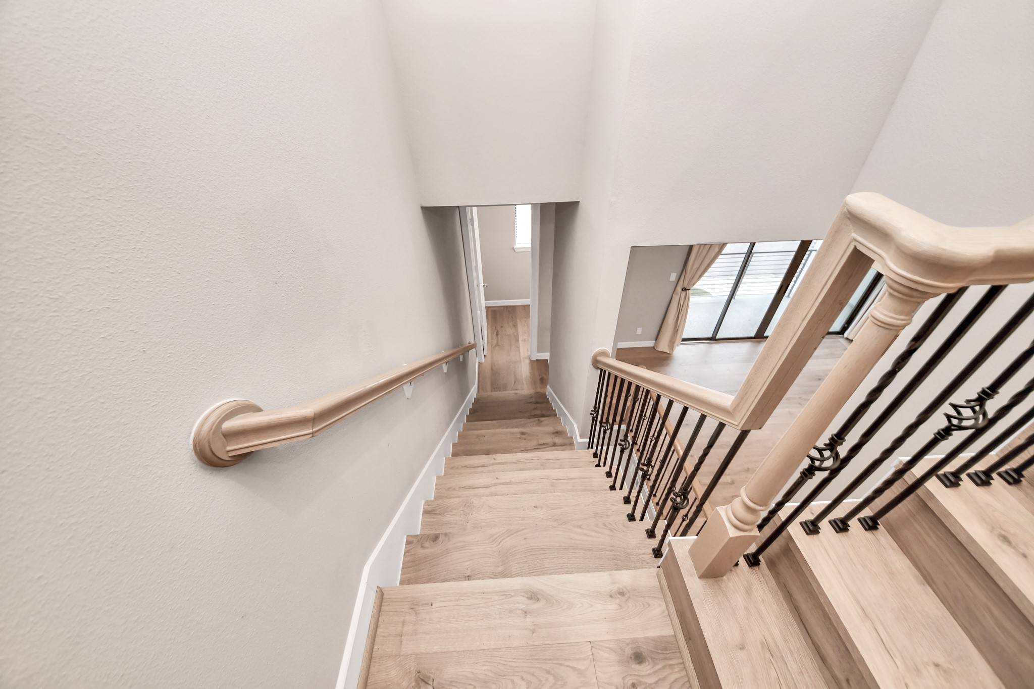 2114 Stuart Street Houston, TX 77004 - Photo 11 of 39 a view of a hallway with staircase
