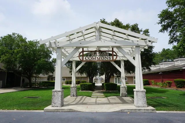 a view of a building and a yard