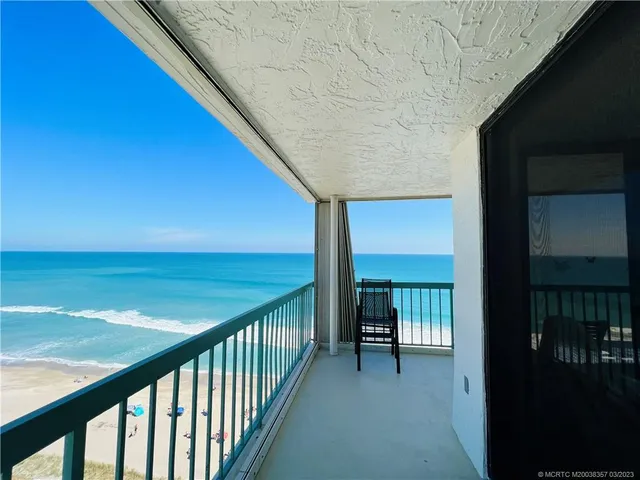 a bedroom with a bed and dresser