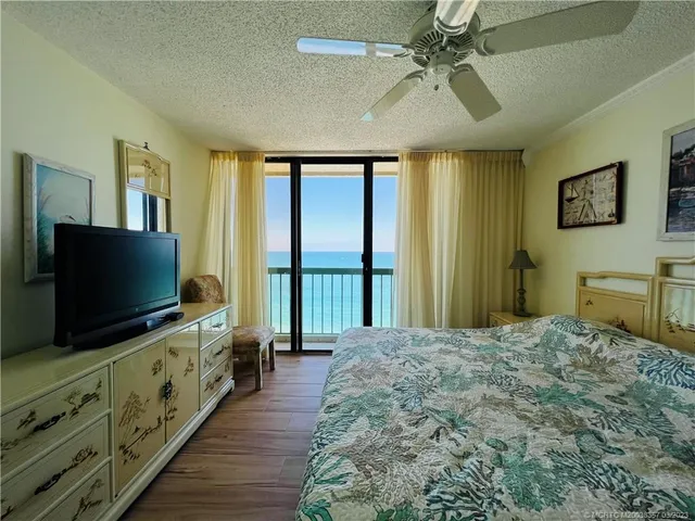 a bathroom with a sink toilet and mirror