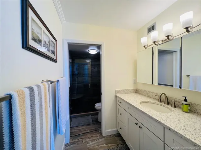 a view of balcony with furniture