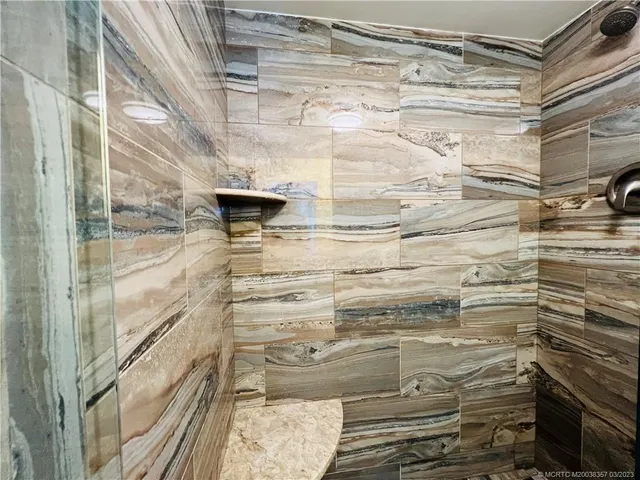 a front view of a house with swimming pool