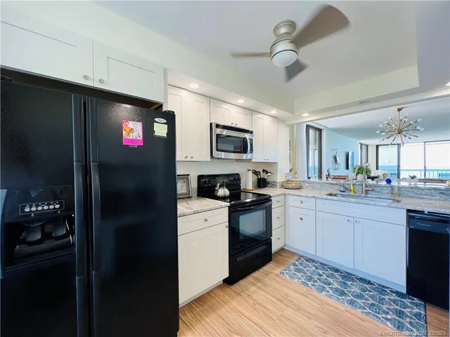 a view of a balcony with chairs