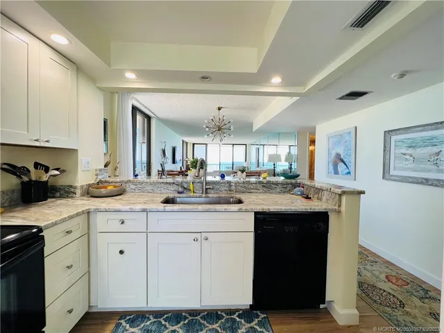 a view of a balcony with chairs